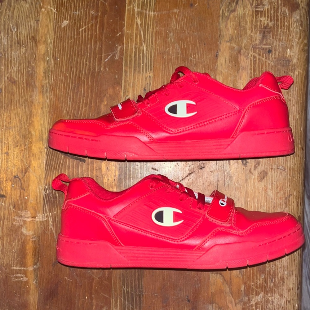 A pair of Champion 3 on 3 low top shoes.